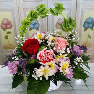 Basket of smiles , mixed colors of roses, carnations, alstroemeria Lillie’s and daisies