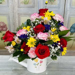 Sprinkle of the season   Red roses, variegated carnations, alstroemeria lilies and yellow Daisys